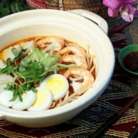 Laksa · Rice noodles, prawns, chicken, bean sprouts and egg, cooked in spicy dried shrimp and coconu...