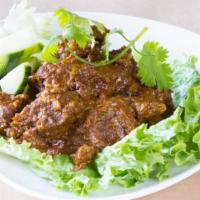 Beef Rendang · Beef slow cooked in star anise, cinnamon, lemongrass spices and coconut milk.