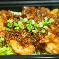 Coconut Prawns · Fresh prawns tossed in wine, butter and toasted coconut sauce.