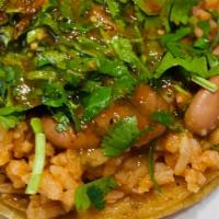 Veggie Taco · Rice, pinto beans, onions, cilantro and salsa.