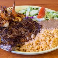 Ribeye steak with shrimp · Served with rice beans and salad.