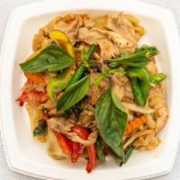 Drunken Noodles · Our signature wide rice noodles with baby corn, green bean, bell pepper, garlic, chili, onio...
