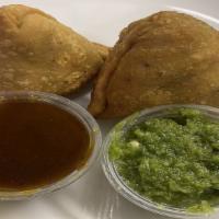 Vegetable Samosa · Vegan, vegetarian, organic. Homemade crispy Indian pastry with spiced peas and potatoes.