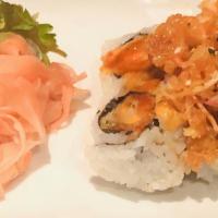 Dynamite Roll · Tuna & ginger deep fried roll with creamy fruity sauce.
