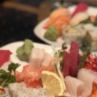 Assorted Sashimi Combo · 12 pieces fresh sashimi served with rice.