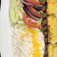 Chicken Shish Plate · Charbroiled grilled skewered cubes meat or veggie served with rice, house salad, hummus, pit...