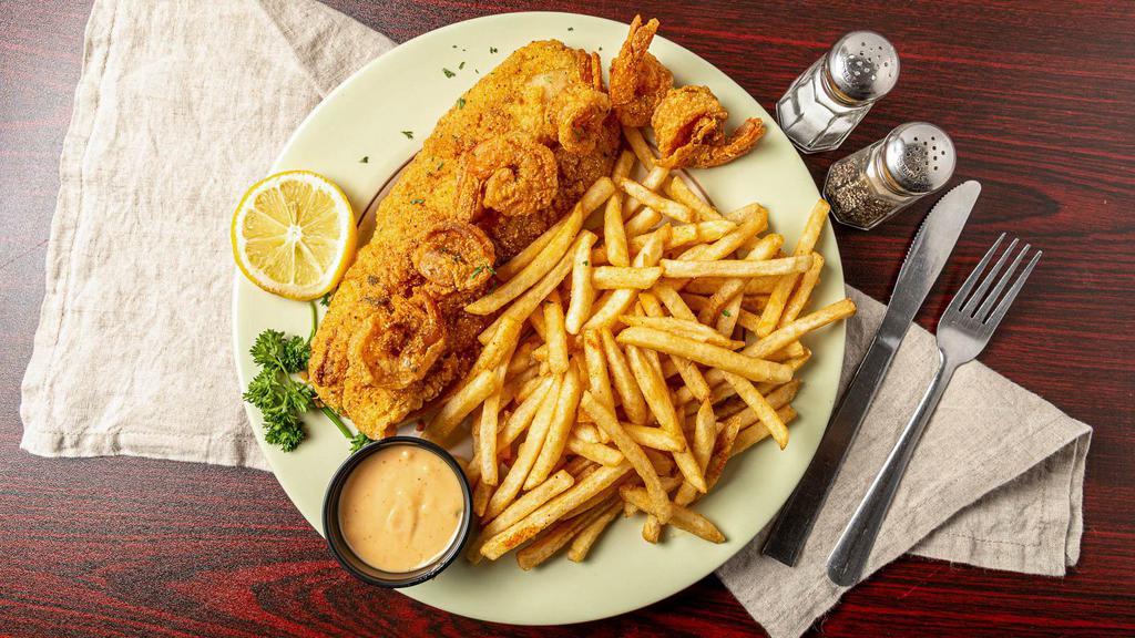 Combo Fish, Shrimp & Fries · Fish and Shrimp combination includes fries, and Solid Rock sauce.  .