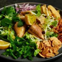 Samusa Salad · Vegetarian. Mixed table-side, this salad is made with vegetarian, hand wrapped, and home-mad...