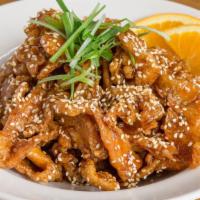 Sesame Chicken · Lightly battered and fried chicken breast cooked with a sweet and tangy sauce. Topped with s...