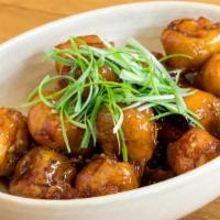 Spicy & Crispy Chicken · Deep fried chicken breast tossed in a spicy and sweet chili sauce with garlic. A staff favor...