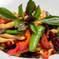 Chicken with Fresh Basil · Wok tossed chicken breast cooked with lemongrass, bell peppers, basil, garlic, and sweet pea...