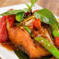 Lemongrass Salmon · Fried salmon topped with chili, lemongrass and bell peppers.