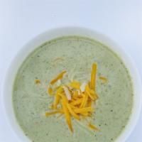Broccoli Soup · Creamy broccoli soup with cheddar cheese. It comes with warm pita bread. Gluten free. (*GF w...