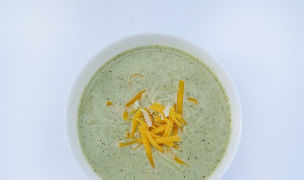 Broccoli Soup · Creamy broccoli soup with cheddar cheese. It comes with warm pita bread. Gluten free. (*GF without pita)