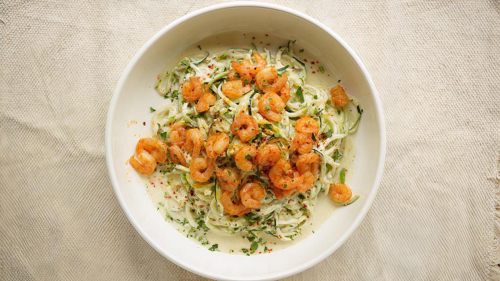 Shrimp Alfredo Zoodle · Zucchini spaghetti with homemade alfredo sauce, spicy shrimp and Parmesan. Gluten free.