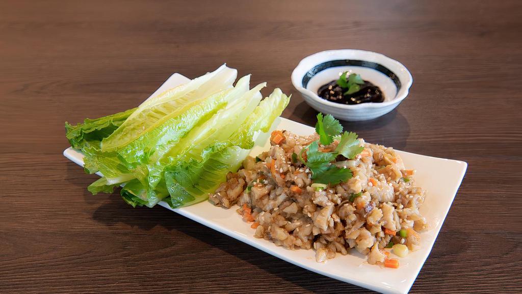 Lettuce Wrap · Sliced water chestnut, radish, green onions, mushrooms and carrots with lettuce and side of hoisin sauce. (Dairy Free, Vegan Option, Gluten Free Option)