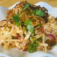 Burmese style Papaya Salad · Shredded fresh green papaya tossed with cabbage, fresh red onions, cilantros, crushed red ch...