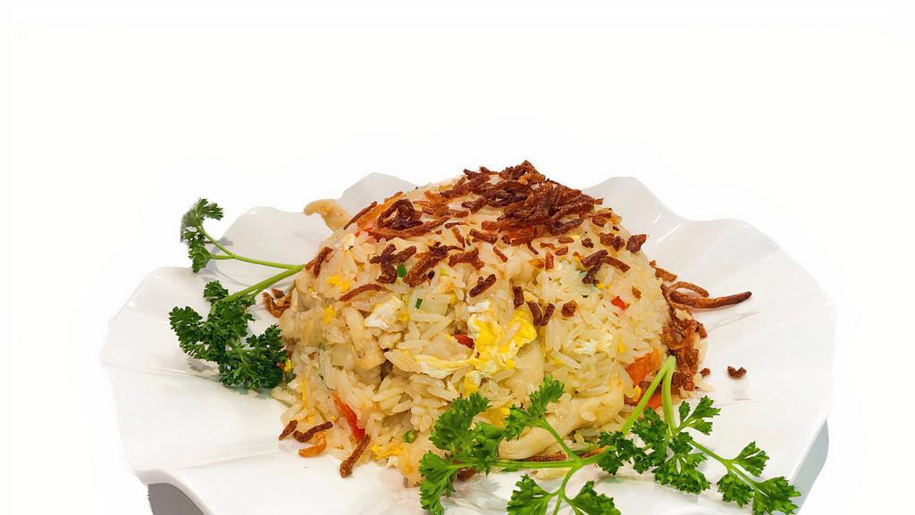 House Fried Rice · Spicy, gluten-free. Stir-fried jasmine rice with garlic, egg, diced green bean, onions, green onions, bell peppers and topped with fried onions