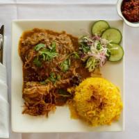 Burmese Style Chicken Biryani · Slowly cooked chicken drumstick and thigh marinated in butter, yogurt, masala, onions, and g...