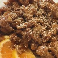 Sesame Chicken · Breaded deep-fried chicken tossed with house special honey soy sauce topped with sesame and ...