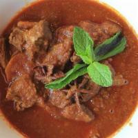 Traditional Red Curry · House special sauce with garlic, ginger and red chili in traditional curry. (Gluten Free)