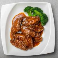 Honey Chicken Wings · Deep fried breaded chicken wings tossed in honey soy sauce ginger, garlic dried chill sweet ...