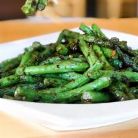 String Beans · Stir fried string beans with garlic and ginger with house sweet chili sauce.