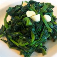 Pea Shoots · Vegetarian, vegan, gluten-free. Simply stir-fried pea shoots with garlic and cooking white w...