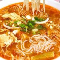 20 .  Bún Rieu · Tomatoes Soup w/ Pasted Shrimp, Pork Rib, Tofu w/ Vermicelli Noodle