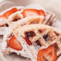 strawberry guava mochi waffle · vegetarian 
fresh strawberries, guava cream, mochi, confectioners sugar