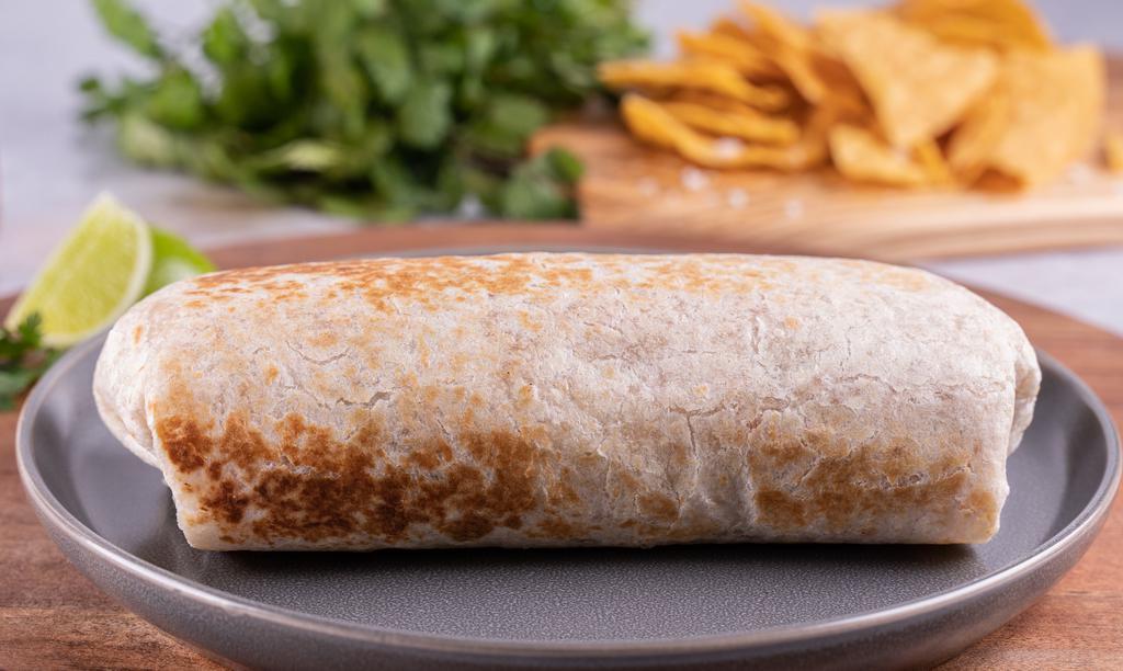 Super Burrito · Choice of meat, rice, beans, Pico de Gallo, cheese, sour cream, guacamole, and salsa.