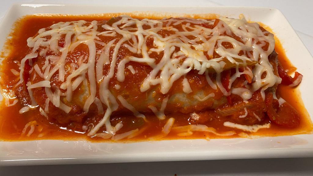 Burrito Mojado (Wet Burrito) · Tortilla filled with choice of meat, rice, beans, Pico de Gallo, sour cream and guacamole then covered with red sauce and cheese.