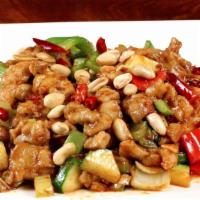 B10. Kung Pao Chicken · Diced chicken with water chestnut celery zucchini and green pepper stir fried in spicy brown...