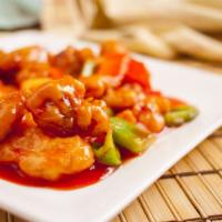 B3. Sweet and Sour Pork · Deep fried crispy pork with pineapple chunks bell peppers onions and carrots wedges combined...