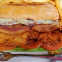 Crispy Chicken Sandwich · Hand Breaded Golden Brown Chicken  Breast w/ Bacon. Pepper Jack, Lettuce Tomato, Siracha-Ran...