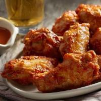 Hot Wings · Hot wings chicken wings marinated in hot spicy sauce.