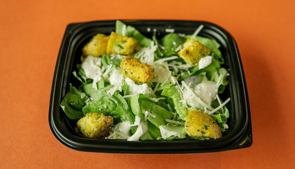 Caesar Salad · Romaine lettuce, romano cheese, croutons, creamy caesar dressing.