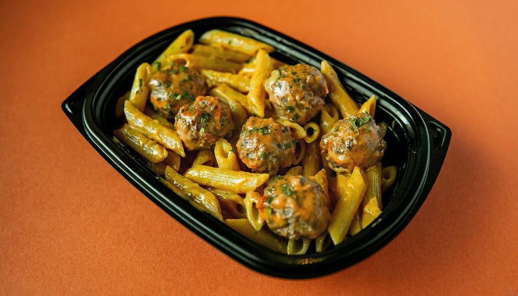 Nashville Hot Meatball Penne Bowl · Beef, veal, pork & ricotta meatballs tossed with spicy Nashville BBQ sauce. Served on a bed of penne pasta