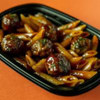 Classic Bbq Meatball Penne Bowl · Beef, veal, pork & ricotta meatballs tossed with sweet and tangy BBQ sauce. Served on a bed ...