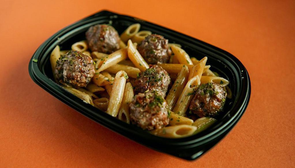 Moroccan 12-Spice Meatball Penne Bowl · Beef, veal, pork & ricotta meatballs tossed with bright Moroccan 12-spice sauce. Served on a bed of penne pasta