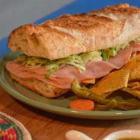 Loche de Jamón / Ham Mexican Sandwich · Bolillo, jamón, crema, mostaza, jitomate, cebolla, jalapeño y lechuga. / Bolillo, Ham, cream...