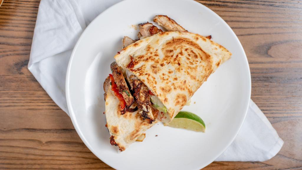 Quesadillas · Choice of chicken mushrooms and mexican squash beef and shrimp .