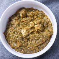 Prawn Saag · Prawns cooked in creamy pesticide-free spinach.