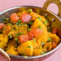 Aloo Gobi · Fresh organic cauliflower cooked with potatoes and organic spices.