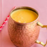 Mango Lassi · Homemade yogurt drink with mango.