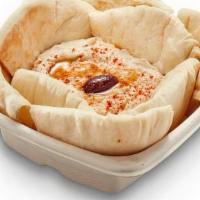 Hummus and Pita · A healthy & delicious garbanzo bean dip made with tahini, lemon juice, garlic, salt, and oli...