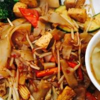 27. Pad Kee Mow · Stir fried noodles with egg, garlic, fresh chili, broccoli, bean sprouts and green onions in...