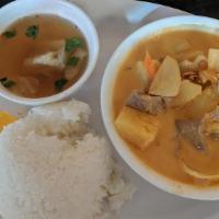 51. Mussamun Curry · Red curry with pineapple, bell peppers, carrots, onions and roasted peanuts.