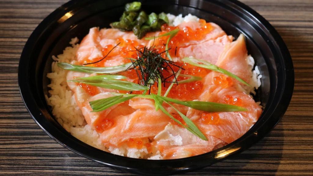 Salmon Meshi · Seared salmon sashimi and salmon roe served on crunchy skillet rice. Due to current ikura (salmon roe) shortage caused by the pandemic, ikura will be replaced to flying fish roe instead.
