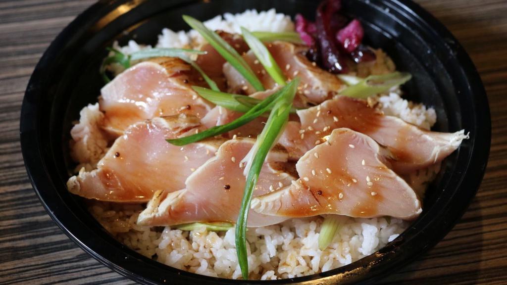 White Tuna Tataki Don · Seared white tuna sashimi over sushi rice topped with wasabi & ponzu sauce